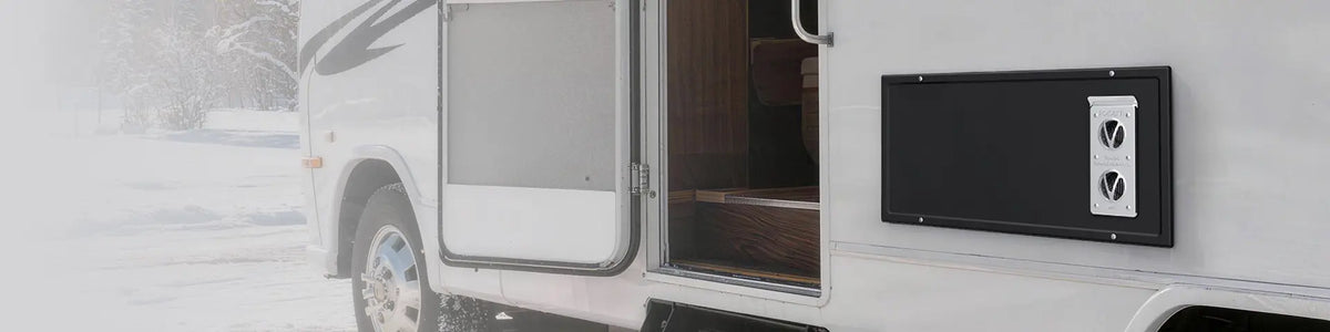 Fogatti RV furnace exterior panel installed on a motorhome during winter camping