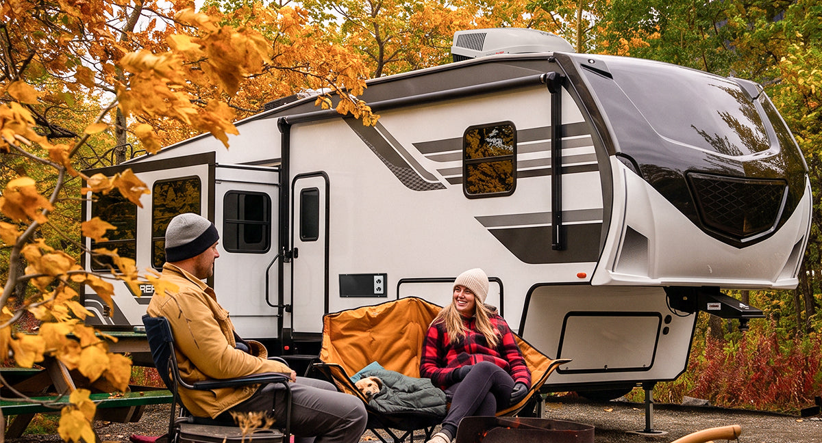Fifth-wheel RV at a fall campsite as cooler-weather RV heating season begins
